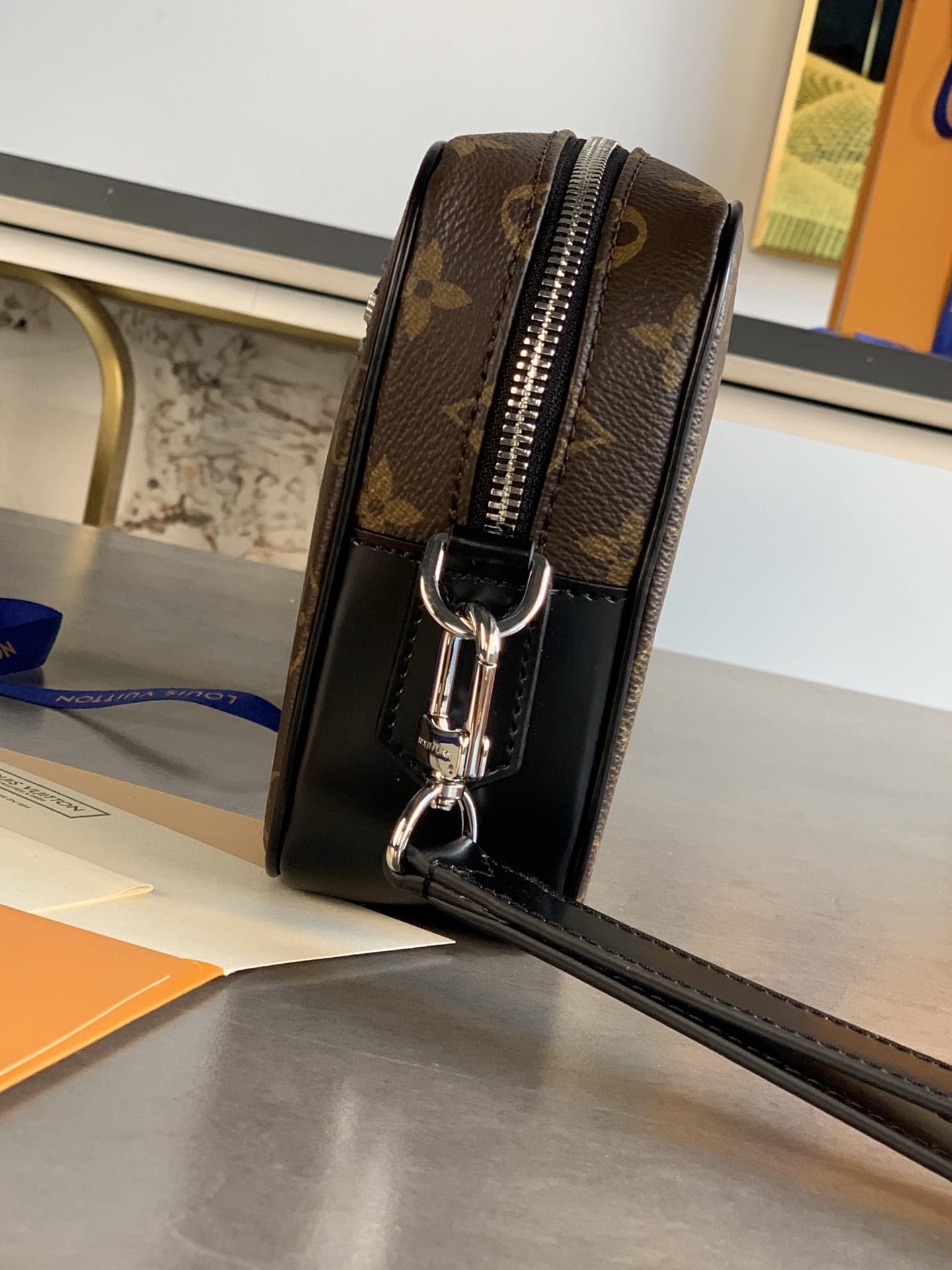 Bolsa Louis Vuitton Kasai Clutch
