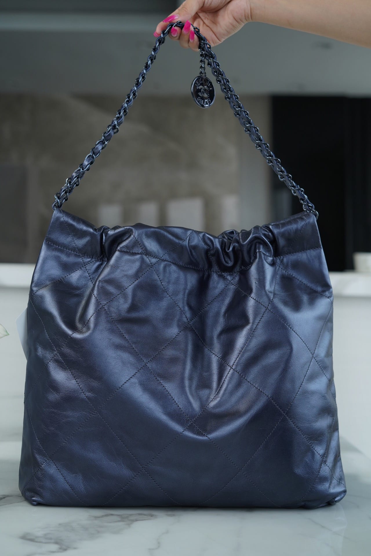 Bolsa CHANEL 22