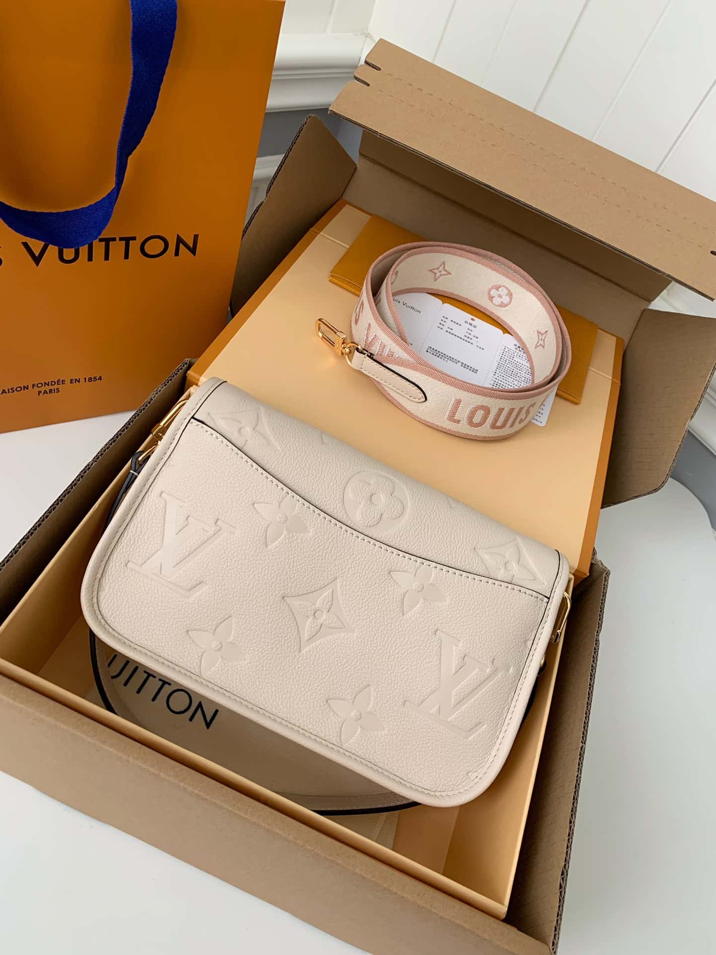 Bolsa Louis Vuitton Diana Creme