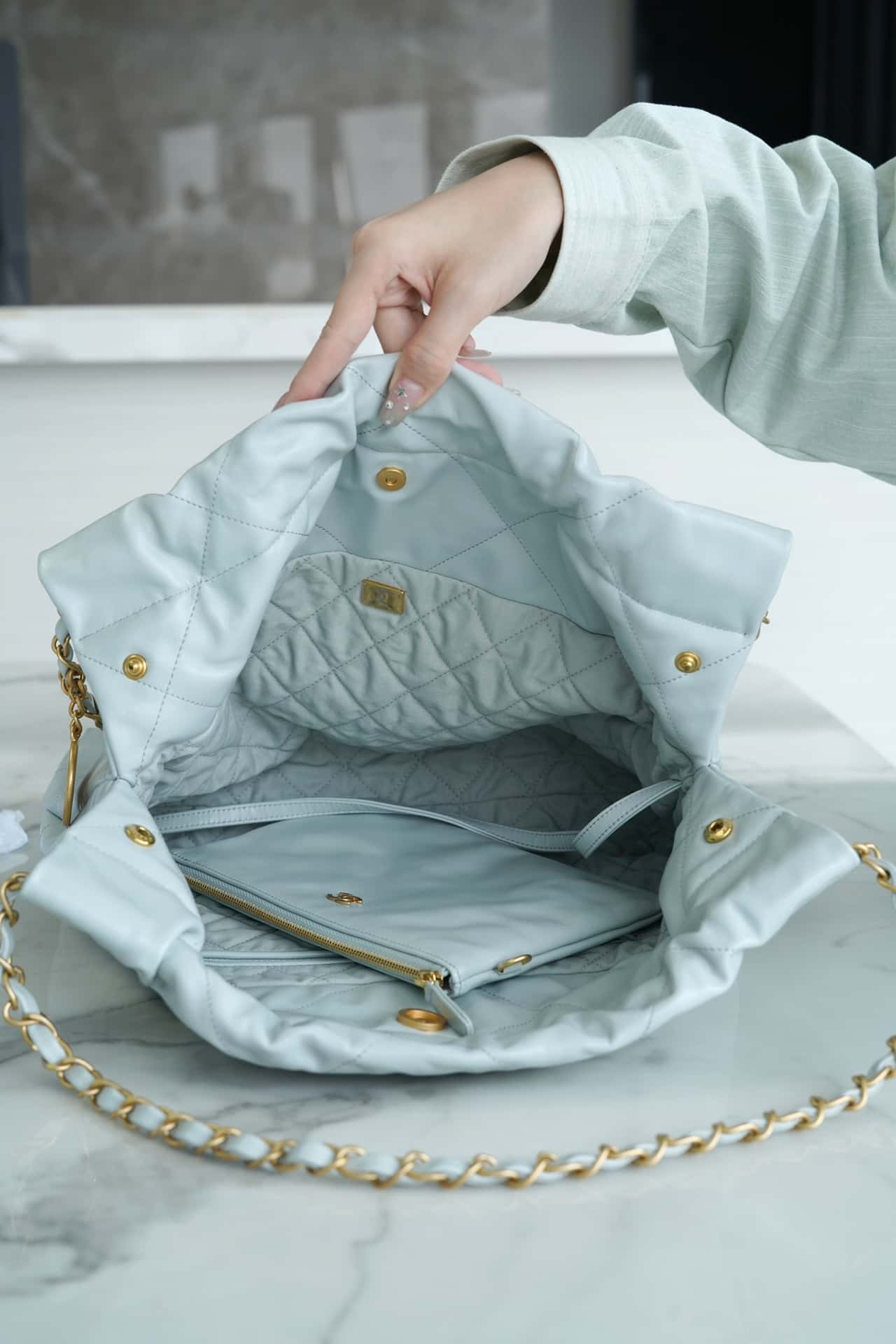 Bolsa CHANEL 22
