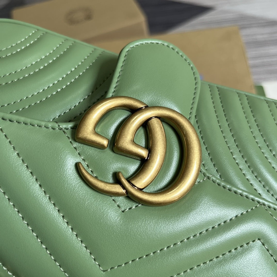 Gucci Bolsa GG Marmont Matelassê Média